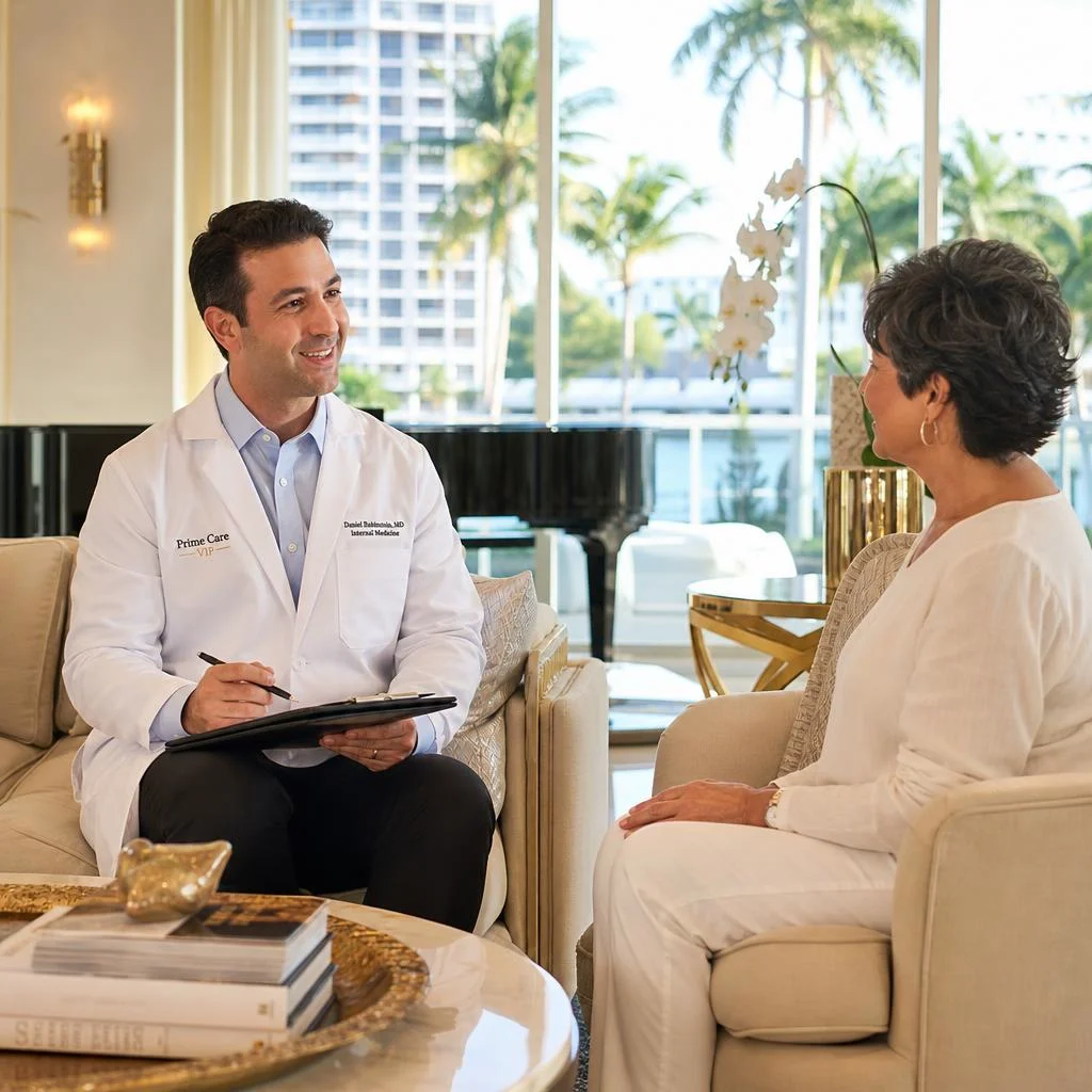 A Prime Care VIP physician having a warm professional conversation with a patient during a concierge house call visit in Dr. Phillips